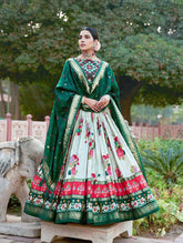 The artistry of Tussar silk and the mesmerizing allure of ikkat Patola prints with this exquisite lehenga choli